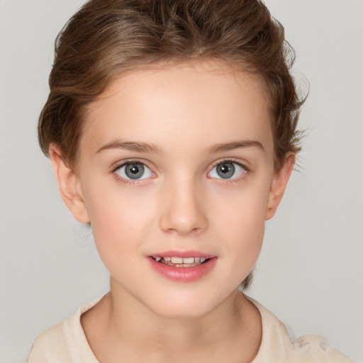 Joyful white child female with short  brown hair and brown eyes