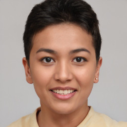 Joyful asian young-adult female with short  brown hair and brown eyes