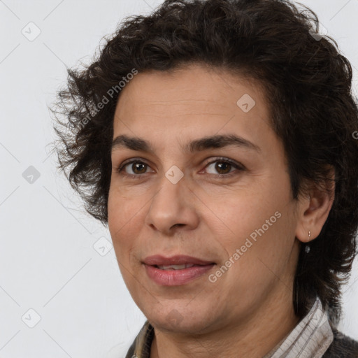 Joyful white adult female with short  brown hair and brown eyes