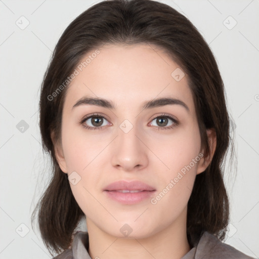 Neutral white young-adult female with medium  brown hair and brown eyes