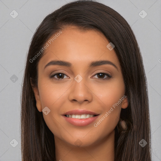 Joyful latino young-adult female with long  brown hair and brown eyes