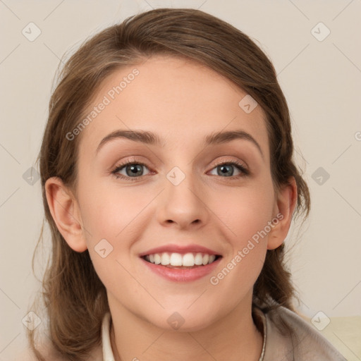 Joyful white young-adult female with medium  brown hair and green eyes