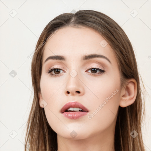 Neutral white young-adult female with long  brown hair and brown eyes