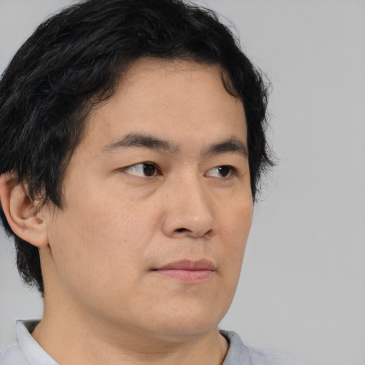 Neutral asian young-adult male with short  brown hair and brown eyes