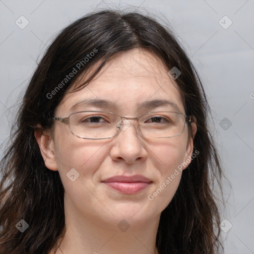 Joyful white adult female with long  brown hair and brown eyes