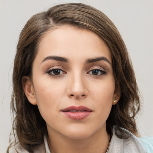 Neutral white young-adult female with medium  brown hair and brown eyes