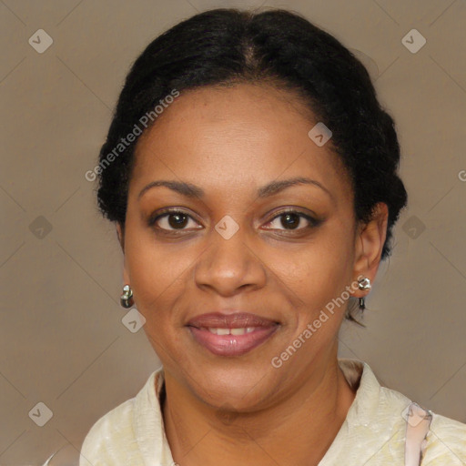 Joyful black adult female with short  brown hair and brown eyes