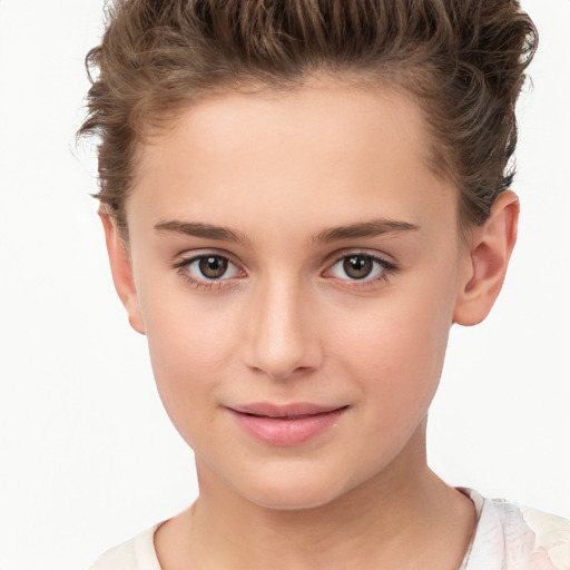 Joyful white child female with short  brown hair and brown eyes