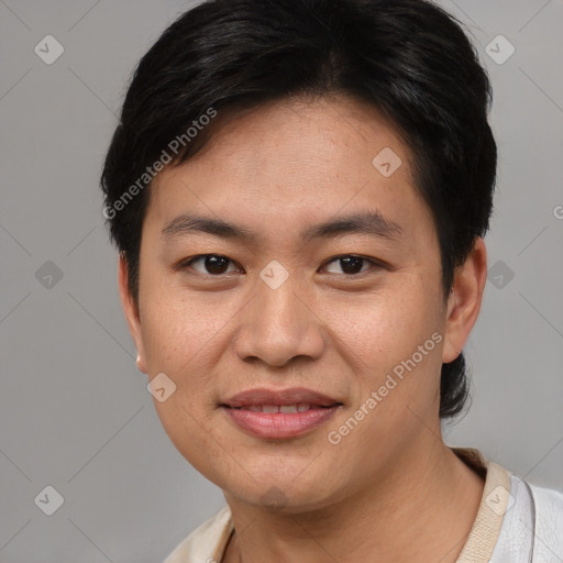 Joyful asian young-adult male with short  brown hair and brown eyes