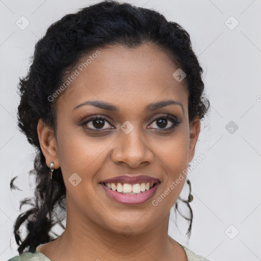 Joyful black young-adult female with medium  brown hair and brown eyes