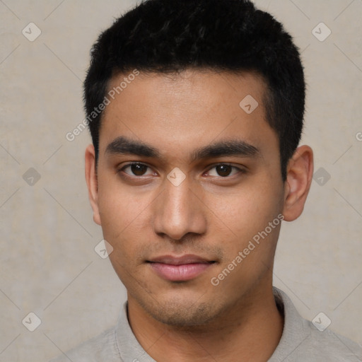 Neutral latino young-adult male with short  black hair and brown eyes