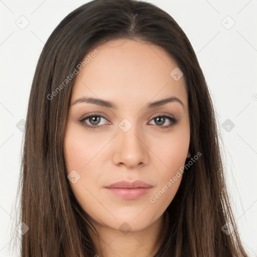 Neutral white young-adult female with long  brown hair and brown eyes