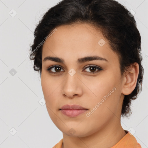 Joyful latino young-adult female with short  brown hair and brown eyes