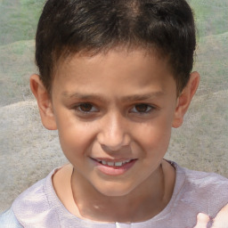 Joyful white child male with short  brown hair and brown eyes