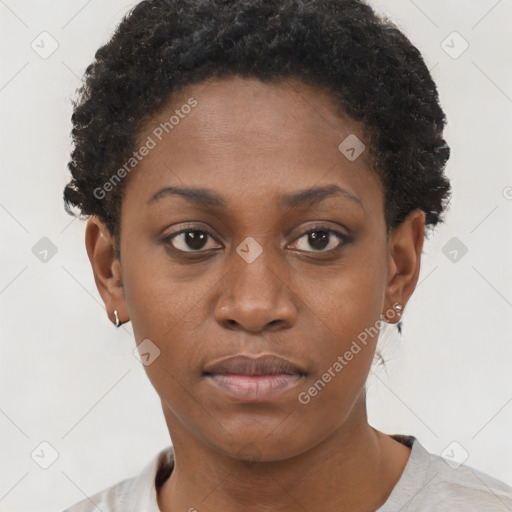 Neutral black young-adult female with short  brown hair and brown eyes