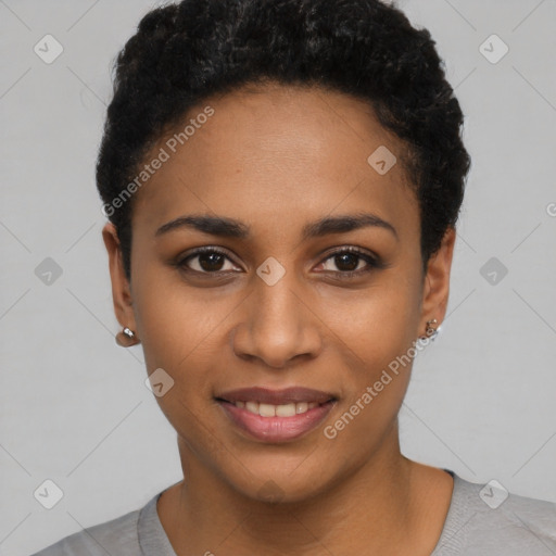 Joyful black young-adult female with short  black hair and brown eyes