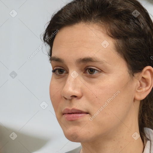 Neutral white young-adult female with short  brown hair and brown eyes