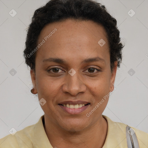 Joyful latino adult female with short  brown hair and brown eyes