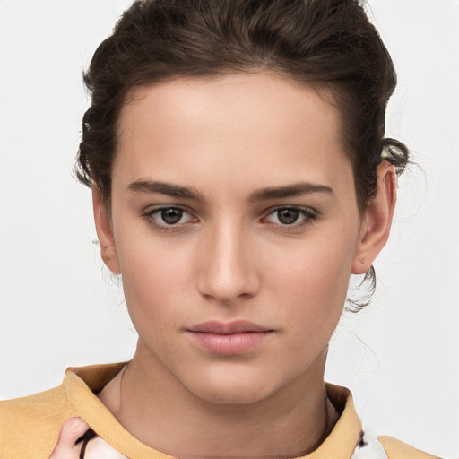 Neutral white young-adult female with short  brown hair and brown eyes