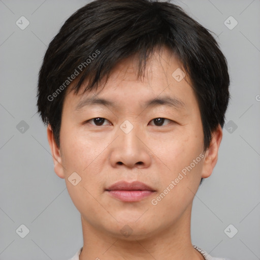 Neutral asian young-adult male with short  brown hair and brown eyes