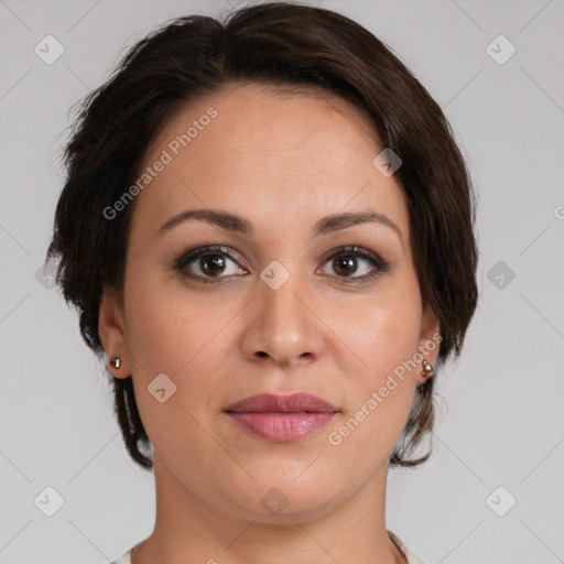 Joyful white adult female with medium  brown hair and brown eyes