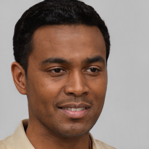 Neutral black young-adult male with short  brown hair and brown eyes