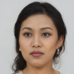 Neutral asian young-adult female with medium  black hair and brown eyes