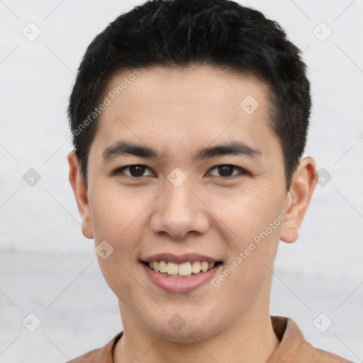 Joyful white young-adult male with short  black hair and brown eyes