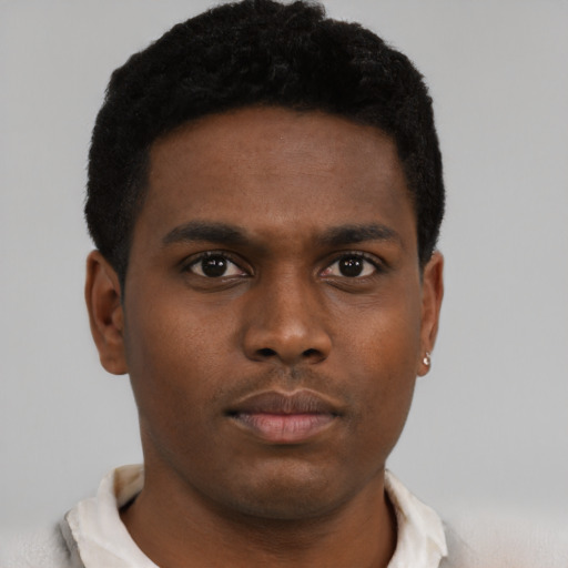 Neutral black young-adult male with short  brown hair and brown eyes