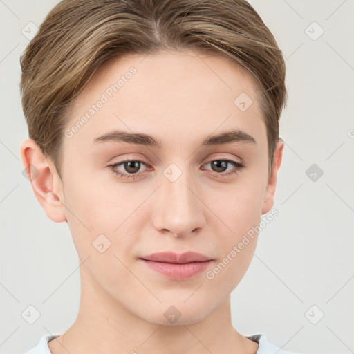 Joyful white young-adult female with short  brown hair and grey eyes