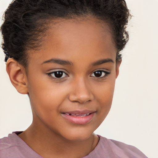 Joyful white child female with short  brown hair and brown eyes