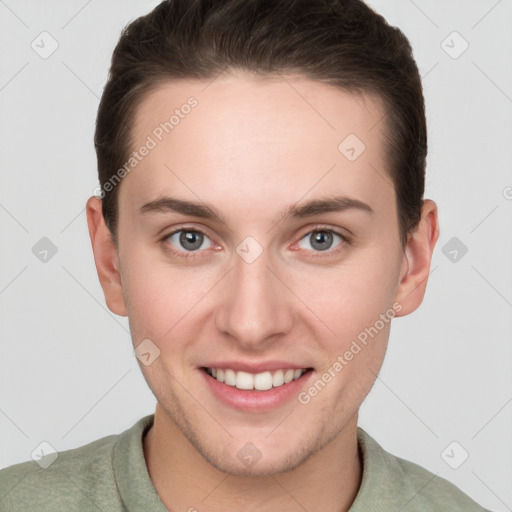 Joyful white young-adult female with short  brown hair and grey eyes