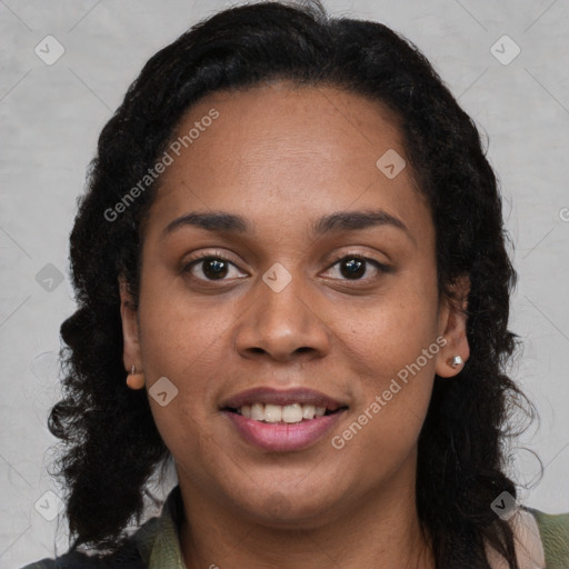 Joyful black young-adult female with long  brown hair and brown eyes