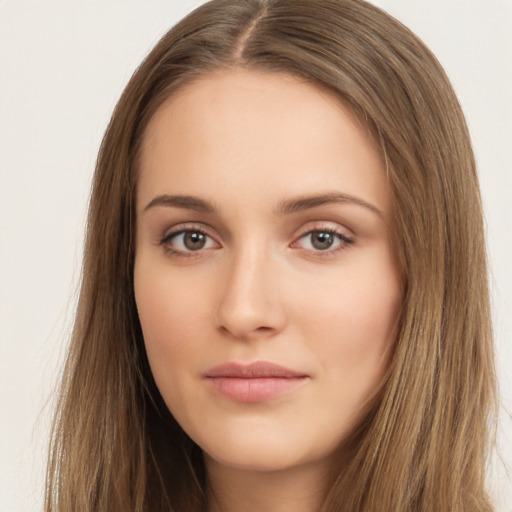 Neutral white young-adult female with long  brown hair and brown eyes