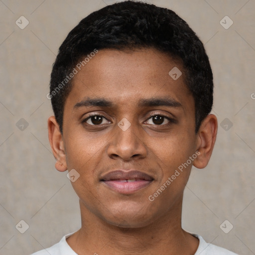 Joyful black young-adult male with short  black hair and brown eyes