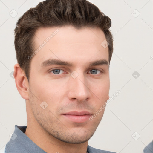 Neutral white young-adult male with short  brown hair and grey eyes