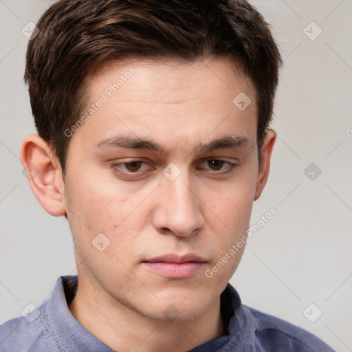 Neutral white young-adult male with short  brown hair and grey eyes