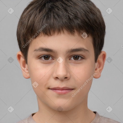 Joyful white child male with short  brown hair and brown eyes