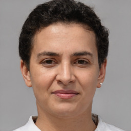 Joyful white adult female with short  brown hair and brown eyes