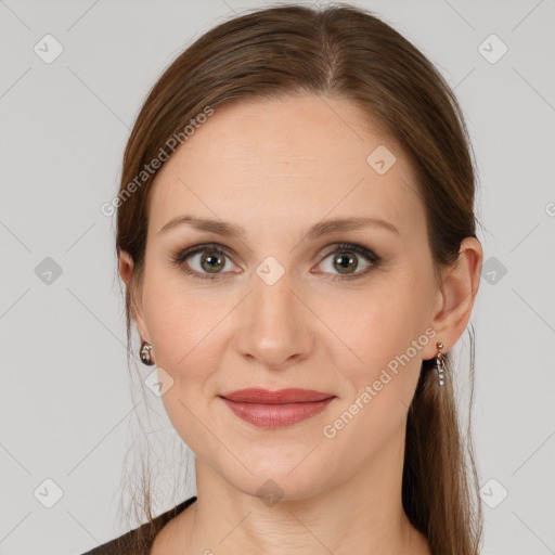 Joyful white young-adult female with long  brown hair and grey eyes