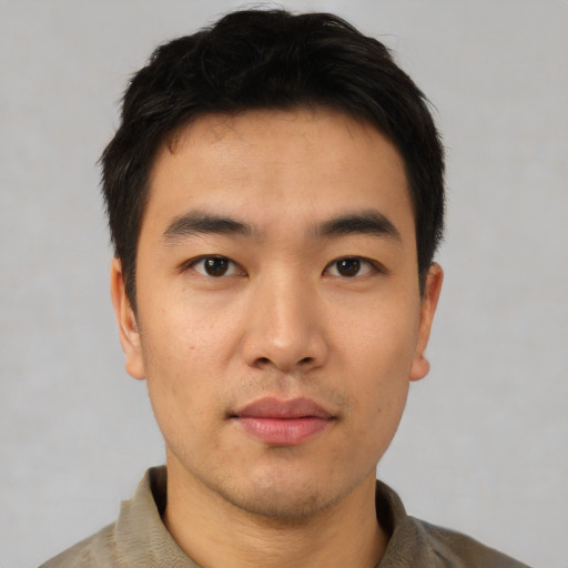 Neutral asian young-adult male with short  brown hair and brown eyes