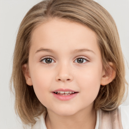 Joyful white child female with medium  brown hair and brown eyes