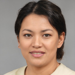 Joyful white young-adult female with medium  brown hair and brown eyes