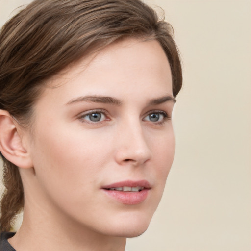 Neutral white young-adult female with medium  brown hair and grey eyes