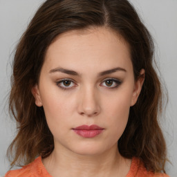 Neutral white young-adult female with medium  brown hair and brown eyes