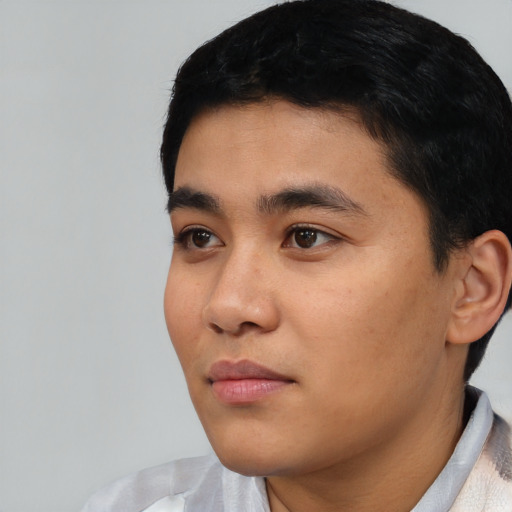 Neutral asian young-adult male with short  black hair and brown eyes