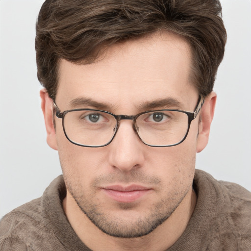 Neutral white young-adult male with short  brown hair and grey eyes