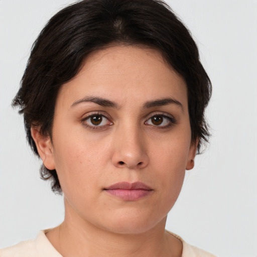 Neutral white young-adult female with medium  brown hair and brown eyes
