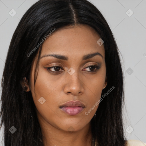 Joyful asian young-adult female with long  brown hair and brown eyes