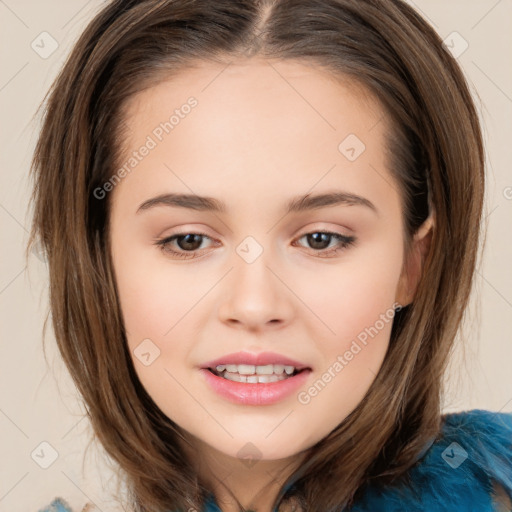 Joyful white child female with long  brown hair and brown eyes